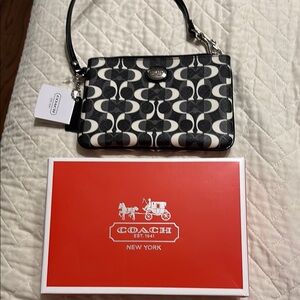 Coach Black and White Graphic Clutch